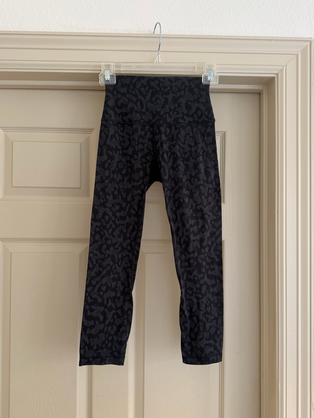 Lululemon black align leggings with dark gray leopard pattern